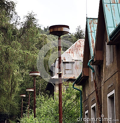 Former Accomodation Resort with Rusty Old Lamps Stock Photo